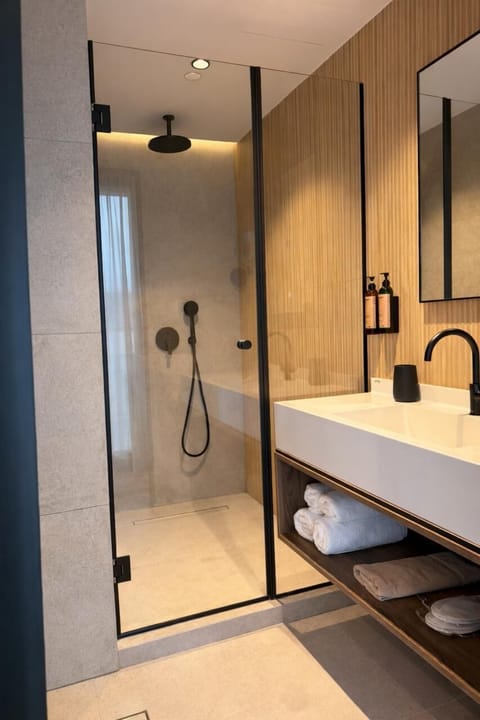 Acropolis Serenity Suite with Hot Tub | Bathroom | Shower, eco-friendly toiletries, hair dryer, slippers