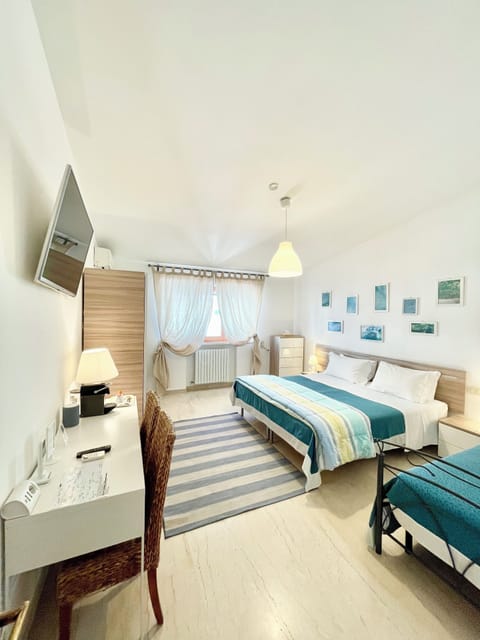 Triple Room, Non Smoking, Private Bathroom | Down comforters, pillowtop beds, minibar, individually decorated