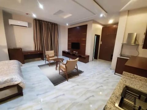 Family Apartment, Balcony, City View | Desk, laptop workspace, blackout drapes, soundproofing