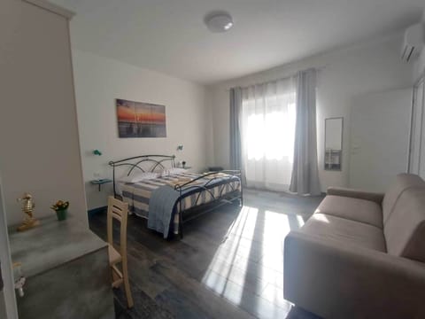 Comfort Double Room, City View | In-room safe, desk, blackout drapes, soundproofing