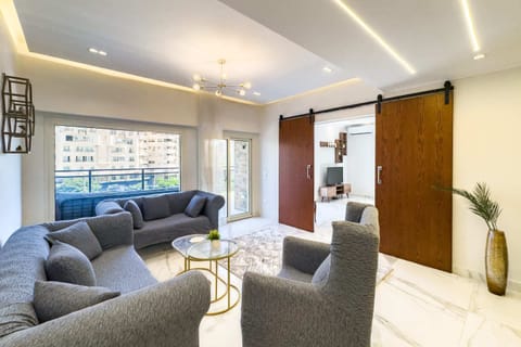 Basic Apartment | Living area | 55-inch Smart TV with satellite channels