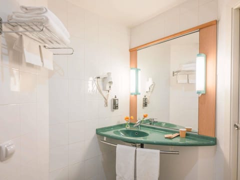 Eco-friendly toiletries, hair dryer, towels