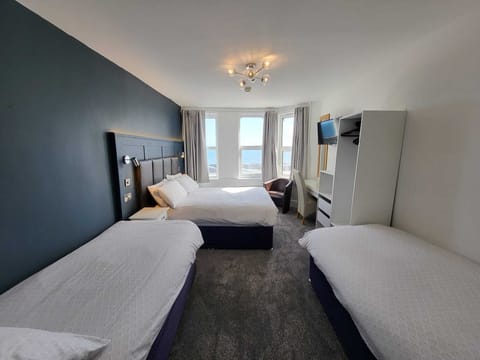 Family Room, Sea View | Iron/ironing board, free WiFi, bed sheets