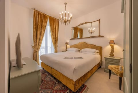 Premium Suite, Balcony, City View | In-room safe, desk, laptop workspace, blackout drapes