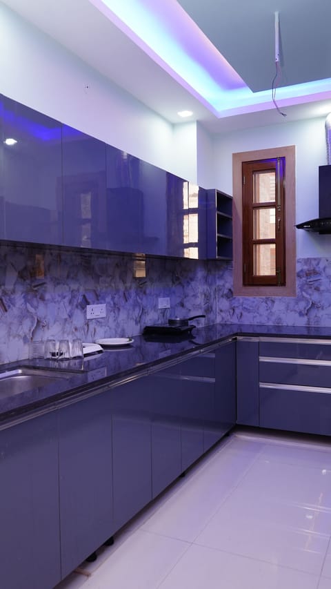Fridge, microwave, cookware/dishes/utensils