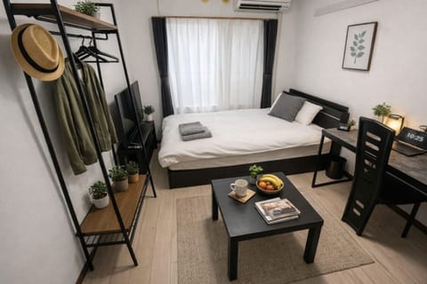 Apartment, Non Smoking, Kitchen | Down comforters, laptop workspace, blackout drapes, free WiFi