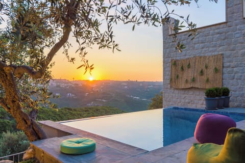 Seasonal outdoor pool, open 7:00 AM to midnight, pool umbrellas