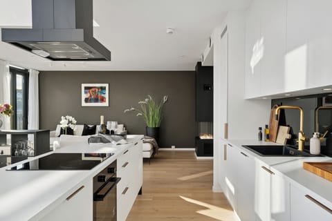 Luxury Duplex, Ocean View | Living area | Flat-screen TV