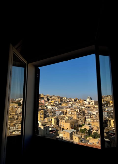 Executive Suite, Balcony, City View | Down comforters, soundproofing, iron/ironing board, free WiFi