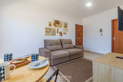 Basic Apartment | Living area | 40-inch TV with digital channels
