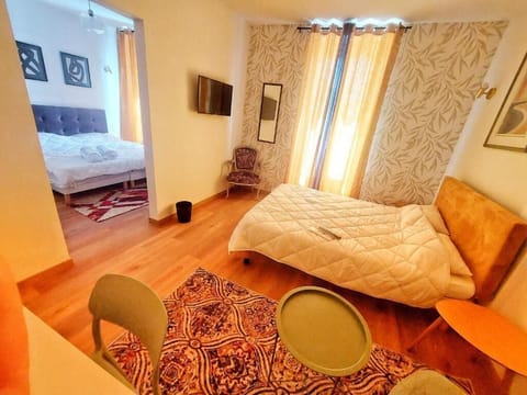 Comfort Quadruple Room | Iron/ironing board