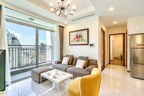 Standard Apartment, Balcony, City View | Living area | 50-inch Smart TV with digital channels