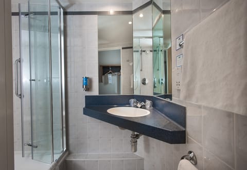 Shower, eco-friendly toiletries, hair dryer, towels