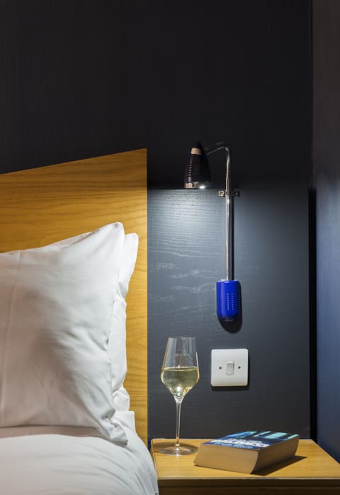 Standard Room (with Free Hot Breakfast) | Desk, blackout drapes, iron/ironing board, free cribs/infant beds