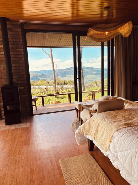 Luxury Double Room, Mountain View | Minibar (some free items), desk, laptop workspace, soundproofing