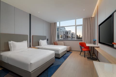 2 Single Standard Stocked Minibar Included | Down comforters, desk, laptop workspace, blackout drapes