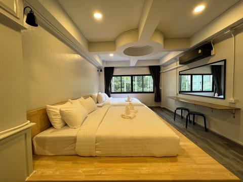 Deluxe Family Room | Blackout drapes, soundproofing, free WiFi, bed sheets