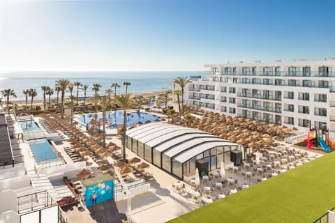 Indoor pool, outdoor pool, pool umbrellas, sun loungers
