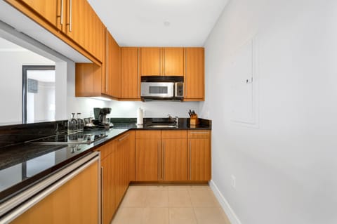 Mini-fridge, microwave, oven, stovetop