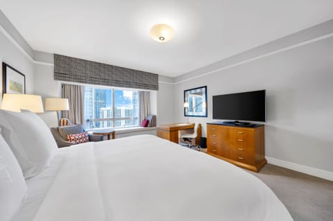 Superior Suite, Partial Ocean View | In-room safe, desk, laptop workspace, free WiFi