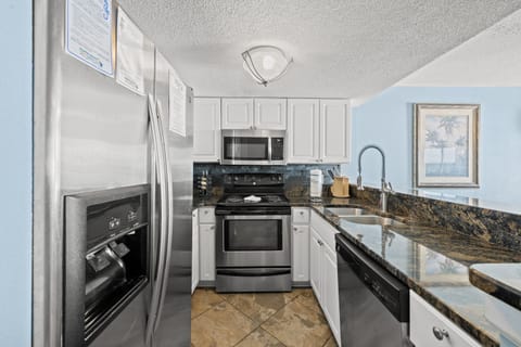 Condo, 2 Bedrooms, Fireplace, Oceanfront (601 - Corner Unit) | Private kitchen | Full-size fridge, microwave, stovetop, dishwasher