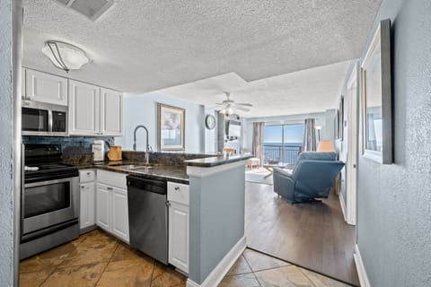 Condo, 2 Bedrooms, Fireplace, Oceanfront (601 - Corner Unit) | Private kitchen | Full-size fridge, microwave, stovetop, dishwasher