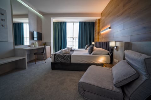 Double or Twin Room, Balcony, Sea View | In-room safe, desk, iron/ironing board, cribs/infant beds