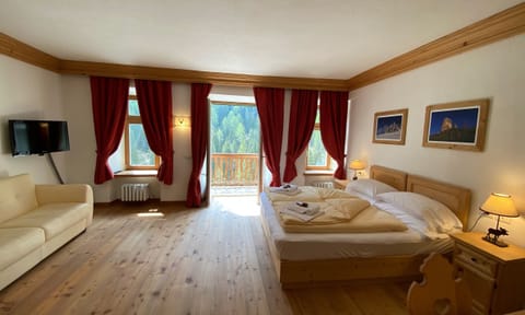 Deluxe Triple Room, Mountain View | In-room safe, desk, soundproofing, free cribs/infant beds