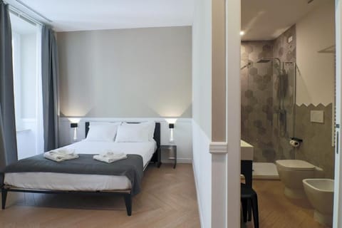 Premium bedding, down comforters, minibar, in-room safe