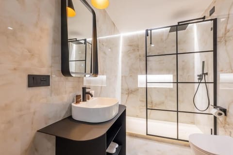 Shower, free toiletries, hair dryer, slippers