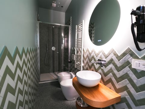 Standard Double Room, Balcony, Garden View | Bathroom | Shower, rainfall showerhead, free toiletries, hair dryer