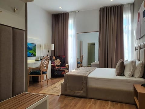 Deluxe Double Room, City View | In-room safe, blackout drapes, iron/ironing board, free WiFi