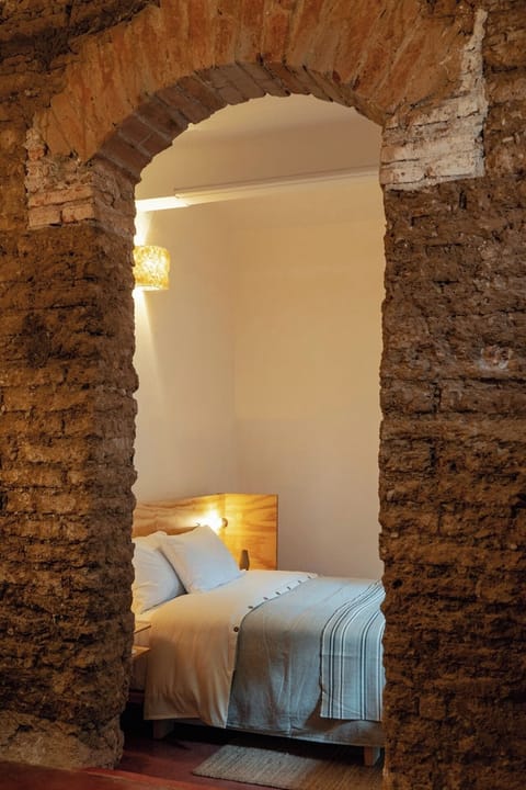 Classic Suite, Courtyard View | Down comforters, memory foam beds, in-room safe, iron/ironing board