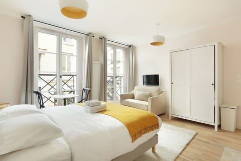 Apartment | Laptop workspace, iron/ironing board, bed sheets