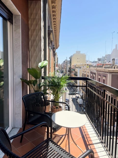 Deluxe Triple Room, Balcony, City View | Balcony