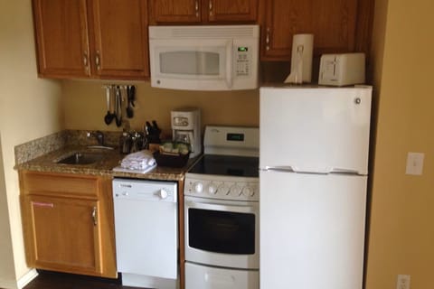 Suite, 1 Bedroom | Private kitchenette | Fridge, microwave, stovetop, coffee/tea maker