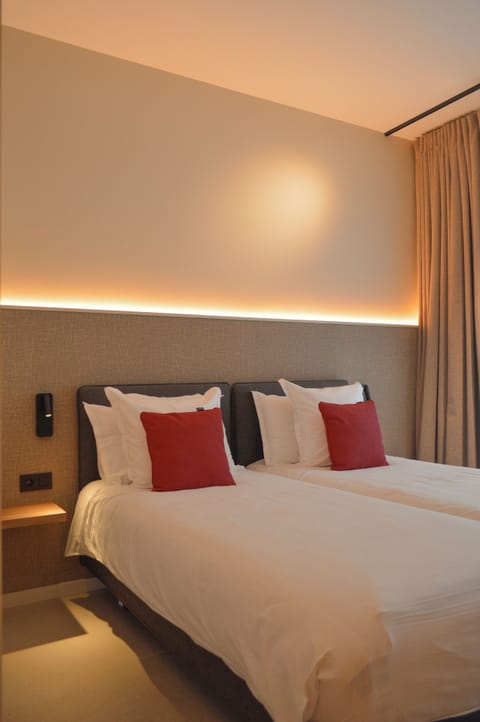 Deluxe Twin Room, City View | Minibar, desk, laptop workspace, free WiFi