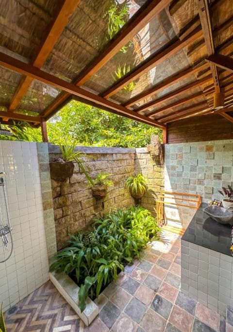 Deluxe Double Room, Balcony, Pool View | Bathroom | Shower, rainfall showerhead, towels, soap