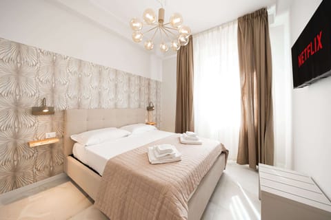 Frette Italian sheets, premium bedding, down comforters