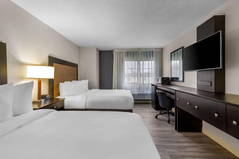 Standard Room, 2 Queen Beds, Non Smoking | Pillowtop beds, desk, iron/ironing board, free cribs/infant beds