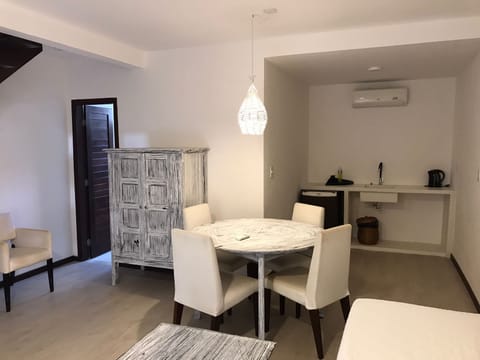 Superior Chalet, Garden View | Living area | TV