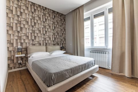 Deluxe Room, 2 Bedrooms, City View | In-room safe, blackout drapes, free WiFi