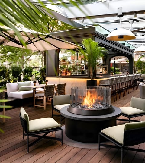 3 bars/lounges, rooftop bar, lobby lounge