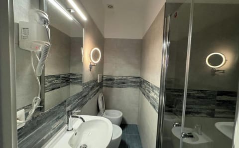 Comfort Room, City View | Bathroom | Bathrobes