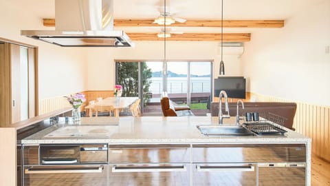 Villa, 3 Bedrooms, Garden View | Private kitchen | Full-size fridge, microwave, stovetop, electric kettle