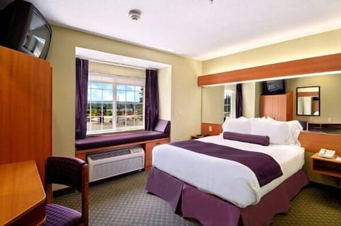 Premium bedding, desk, blackout drapes, iron/ironing board