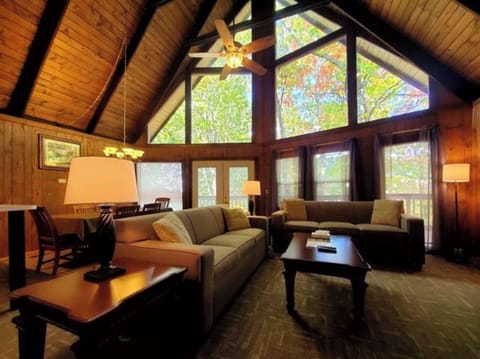 Signature Cabin, 3 Bedrooms, Patio, Mountainside | Living room | 32-inch Smart TV with cable channels, fireplace