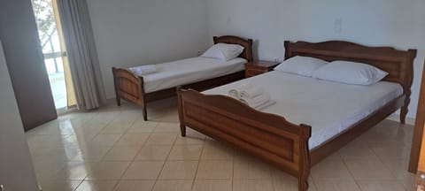 Economy Room, Balcony, Garden View | Iron/ironing board, free WiFi