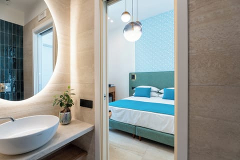 Comfort Double or Twin Room, Balcony, City View | Bathroom | Shower, hair dryer, towels, soap