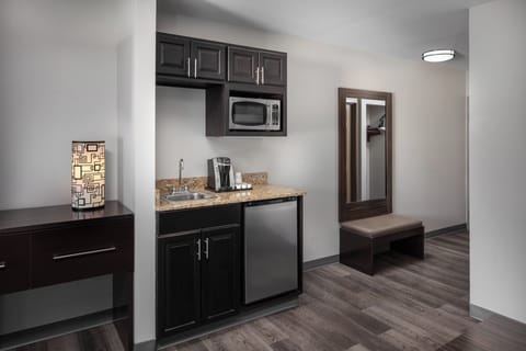 Hypo-allergenic bedding, down comforters, pillowtop beds, in-room safe